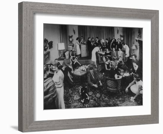 Cocktail Party in the Home of Mrs. R. Craig Montgomery-Yale Joel-Framed Photographic Print