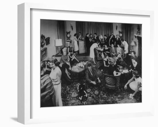 Cocktail Party in the Home of Mrs. R. Craig Montgomery-Yale Joel-Framed Photographic Print