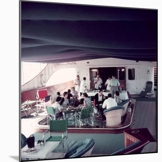 Cocktail Party on Deck of Famous Yacht 'Christina O' Owned by Shipping Magnate Aristotle Onassis-Dmitri Kessel-Mounted Photographic Print