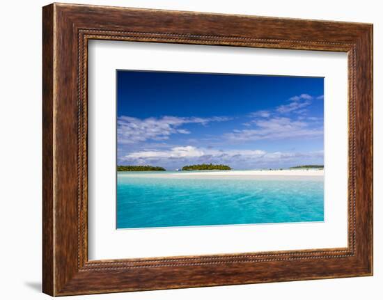 Coconut palm trees line the beach on One Foot Island, Aitutaki, Cook Islands, South Pacific Islands-Michael Nolan-Framed Photographic Print