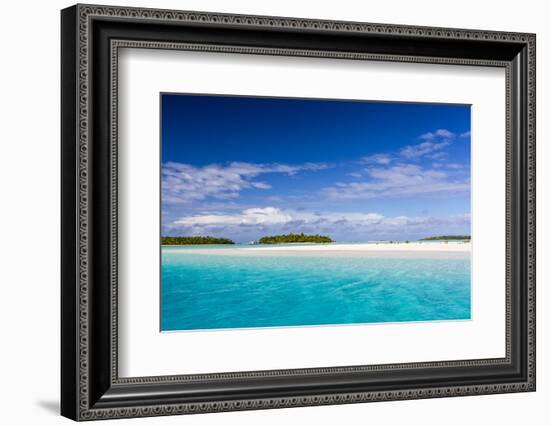 Coconut palm trees line the beach on One Foot Island, Aitutaki, Cook Islands, South Pacific Islands-Michael Nolan-Framed Photographic Print