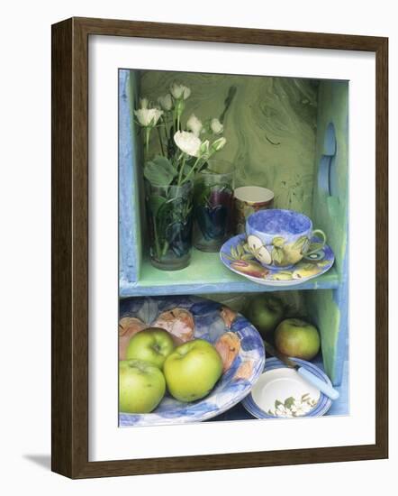 Coffee Cup, Flowers and Bowl of Apples on Shelves-Linda Burgess-Framed Photographic Print