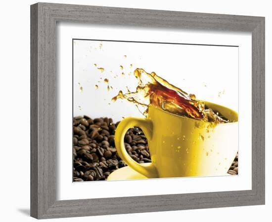 Coffee Spilling Out of a Cup-Dieter Heinemann-Framed Photographic Print