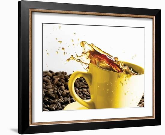 Coffee Spilling Out of a Cup-Dieter Heinemann-Framed Photographic Print