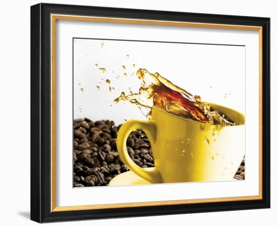 Coffee Spilling Out of a Cup-Dieter Heinemann-Framed Photographic Print