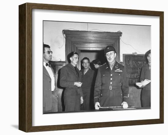 Col. Burton Andrus Announcing Suicide of Hermann Goering During Trial of German War Criminals-null-Framed Photographic Print