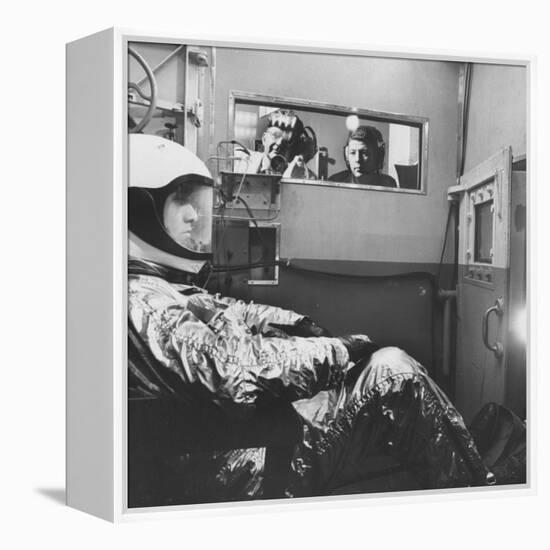 Col. John P. Stapp Watching a Subject in the Altitude Chamber-null-Framed Premier Image Canvas