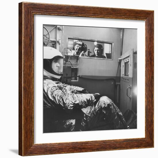 Col. John P. Stapp Watching a Subject in the Altitude Chamber-null-Framed Photographic Print