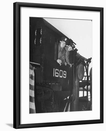 Col. Ryan and Major General Mcmullen Looking Out the Cab of a New Locomotive-null-Framed Photographic Print