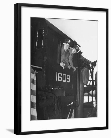 Col. Ryan and Major General Mcmullen Looking Out the Cab of a New Locomotive-null-Framed Photographic Print