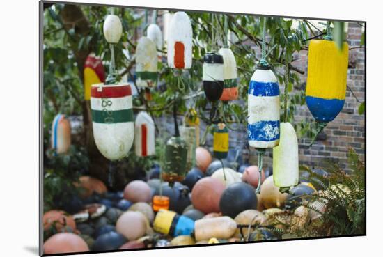 Collection Of Old Crab Buoys In Yard-Justin Bailie-Mounted Photographic Print