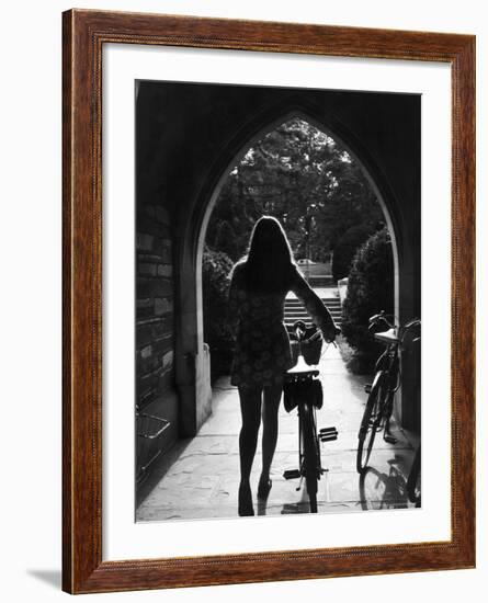 College Co-Ed Walking Bicycle Through an Archway on the Campus of Princeton University-Alfred Eisenstaedt-Framed Photographic Print