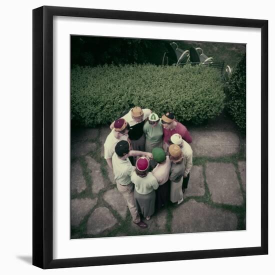 College Men and Woman Flipping a Coin on Purdue Campus, West Lafayette, Indiana 1954-Nina Leen-Framed Photographic Print