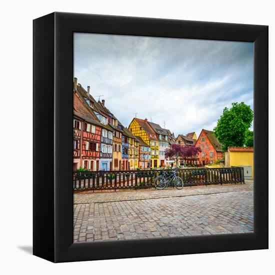 Colmar, Petit Venice, Bridge, Bike and Traditional Houses. Alsace, France.-stevanzz-Framed Premier Image Canvas