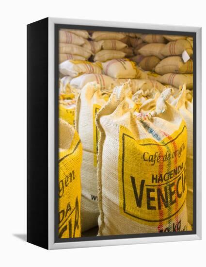 Colombia, Caldas, Manizales, Hacienda Venecia, Coffee in Sisal Bags Ready for Export-Jane Sweeney-Framed Premier Image Canvas