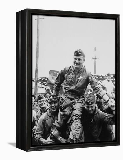 Colonel Robin Olds Celebrates His 100th Combat Mission, Vietnam, 1967-null-Framed Stretched Canvas