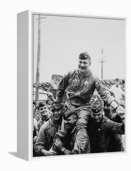 Colonel Robin Olds Celebrates His 100th Combat Mission, Vietnam, 1967-null-Framed Stretched Canvas