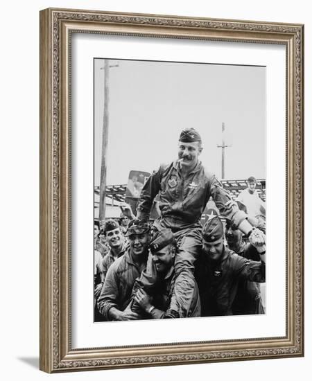 Colonel Robin Olds Celebrates His 100th Combat Mission, Vietnam, 1967-null-Framed Photo