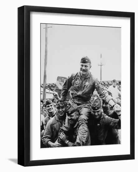 Colonel Robin Olds Celebrates His 100th Combat Mission, Vietnam, 1967-null-Framed Photo