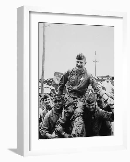 Colonel Robin Olds Celebrates His 100th Combat Mission, Vietnam, 1967-null-Framed Photo