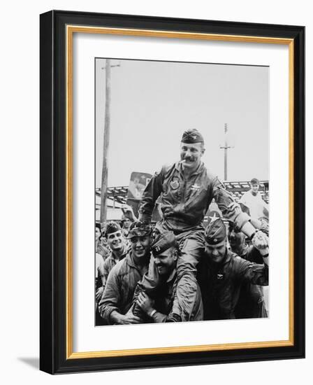 Colonel Robin Olds Celebrates His 100th Combat Mission, Vietnam, 1967-null-Framed Photo