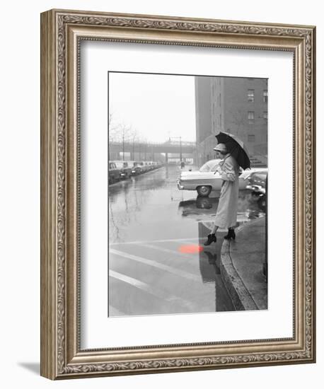 Color Pop,1950s WOMAN IN RAIN COAT HAT BOOTS HOLDING UMBRELLA CROSSING CITY STREET-null-Framed Photographic Print