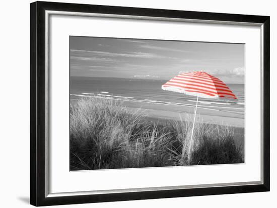 Color Pop, Beach umbrella on the beach, Saunton, North Devon, England, Living Coral-null-Framed Premium Photographic Print