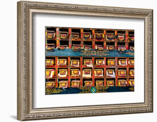 Color wall of books at buddhist monastery in Tengboche, Nepal on the way to Everest Base Camp-David Chang-Framed Photographic Print