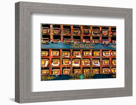 Color wall of books at buddhist monastery in Tengboche, Nepal on the way to Everest Base Camp-David Chang-Framed Photographic Print