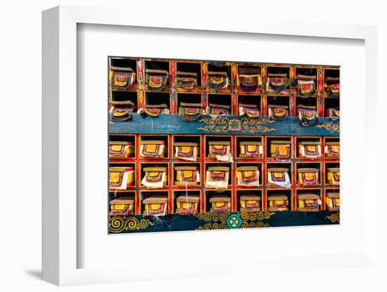 Color wall of books at buddhist monastery in Tengboche, Nepal on the way to Everest Base Camp-David Chang-Framed Photographic Print