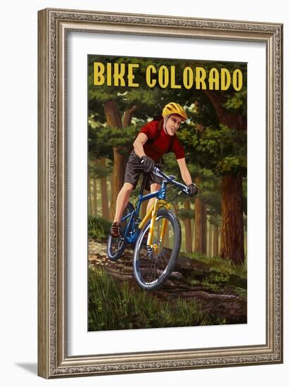 Colorado - Mountain Biker in Trees-Lantern Press-Framed Art Print