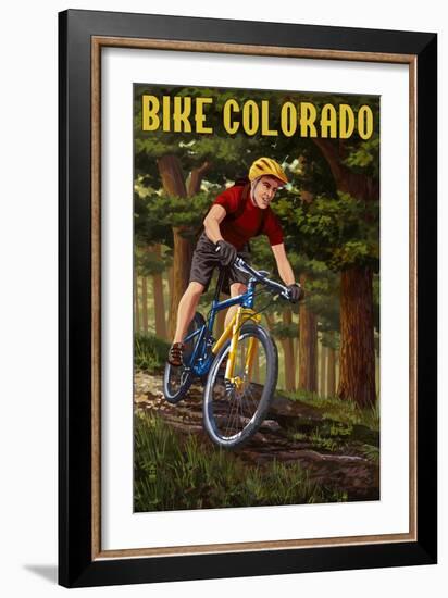 Colorado - Mountain Biker in Trees-Lantern Press-Framed Art Print