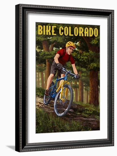 Colorado - Mountain Biker in Trees-Lantern Press-Framed Art Print