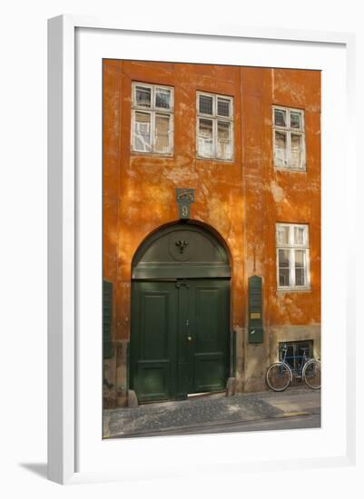 Colorful Building with Bikes Parked Outside, Copenhagen, Denmark-Inger Hogstrom-Framed Photographic Print