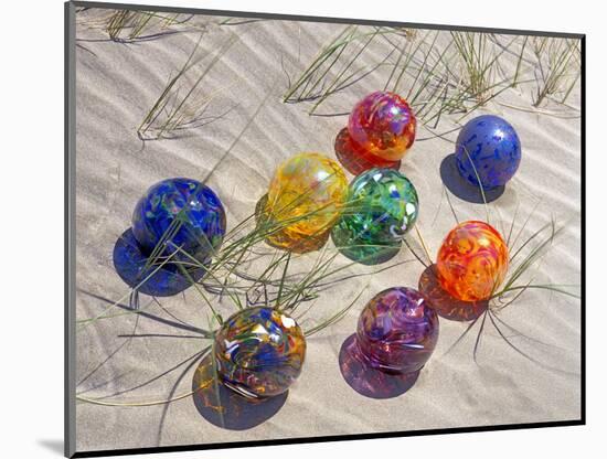 Colorful Glass Floats on Sand Dune, Oregon, USA-Jaynes Gallery-Mounted Photographic Print