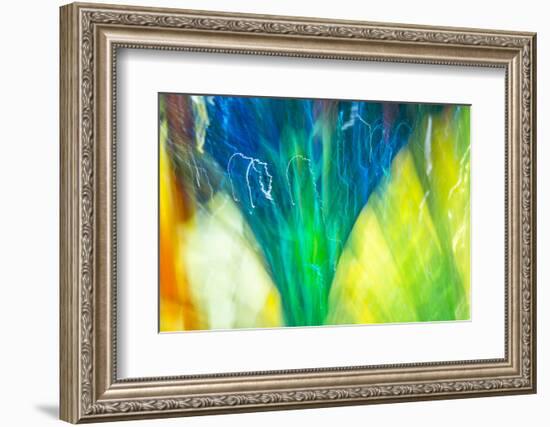 Colorful glass with blurred motion effect.-Stuart Westmorland-Framed Photographic Print