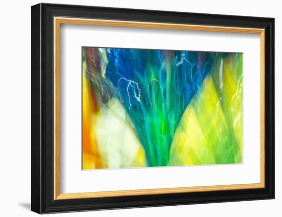 Colorful glass with blurred motion effect.-Stuart Westmorland-Framed Photographic Print