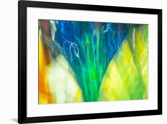 Colorful glass with blurred motion effect.-Stuart Westmorland-Framed Premium Photographic Print