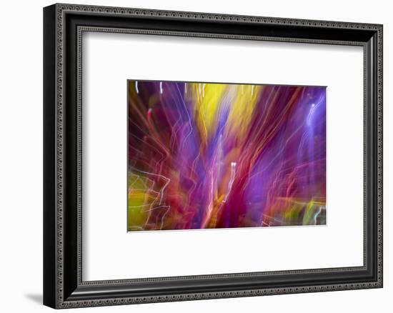 Colorful glass with blurred motion effect.-Stuart Westmorland-Framed Photographic Print