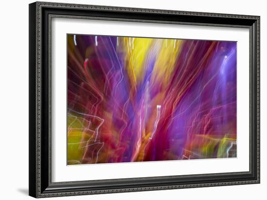 Colorful glass with blurred motion effect.-Stuart Westmorland-Framed Photographic Print