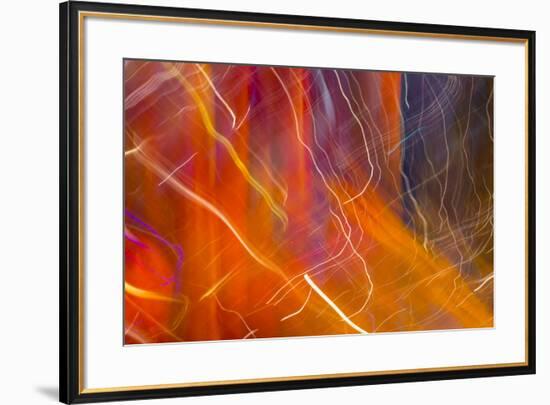 Colorful glass with blurred motion effect.-Stuart Westmorland-Framed Photographic Print