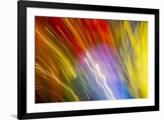 Colorful glass with blurred motion effect.-Stuart Westmorland-Framed Photographic Print