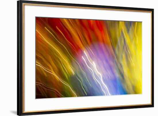 Colorful glass with blurred motion effect.-Stuart Westmorland-Framed Photographic Print