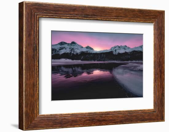 Colorful sky at sunrise on snowcapped mountains and frozen Lake Silvaplana, Maloja, Engadine-Roberto Moiola-Framed Photographic Print