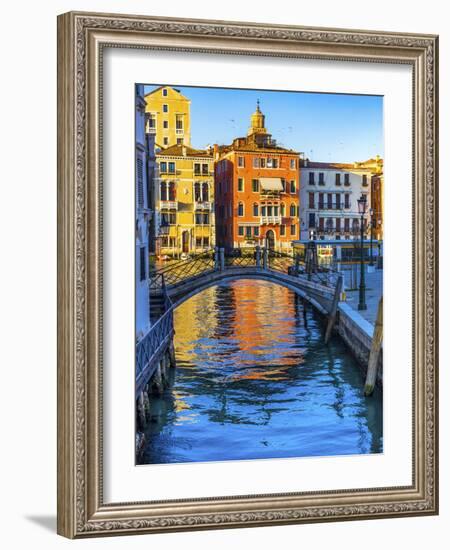 Colorful small canal and bridge Grand Canal creating beautiful reflection in Venice, Italy.-William Perry-Framed Photographic Print