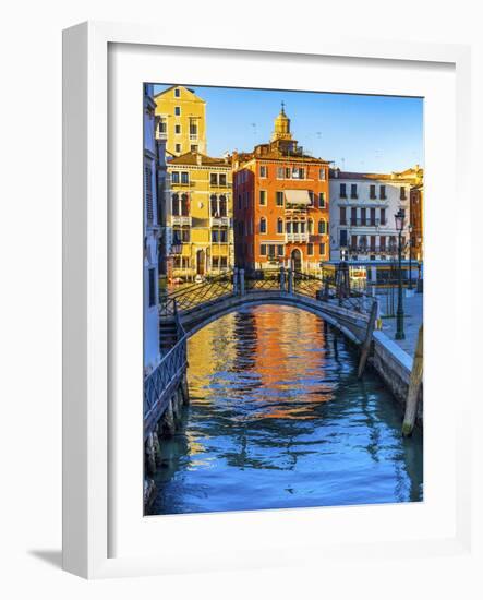 Colorful small canal and bridge Grand Canal creating beautiful reflection in Venice, Italy.-William Perry-Framed Photographic Print