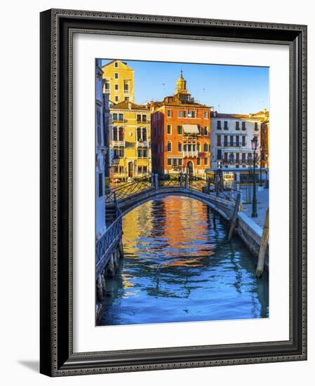 Colorful small canal and bridge Grand Canal creating beautiful reflection in Venice, Italy.-William Perry-Framed Photographic Print