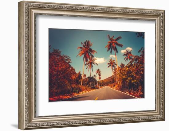 Colorful Sunset Landscape with Empty Road and Palm Trees in Jungle against Clear Blue Sky. Vintage-goinyk-Framed Photographic Print