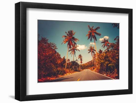 Colorful Sunset Landscape with Empty Road and Palm Trees in Jungle against Clear Blue Sky. Vintage-goinyk-Framed Photographic Print