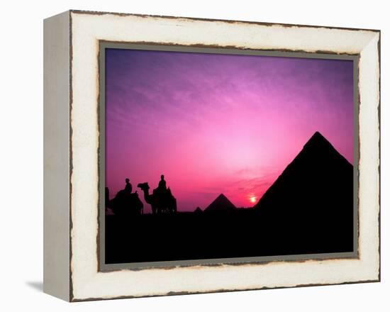 Colorful Sunset Silhouetting Men and Camels at the Great Pyramids of Giza, Egypt-Bill Bachmann-Framed Premier Image Canvas